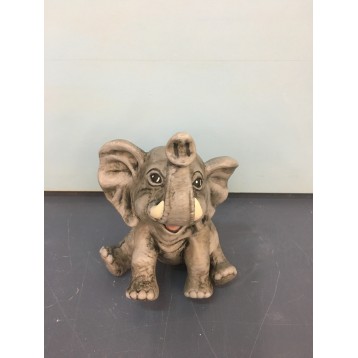 elephant-sitting-with-tusks